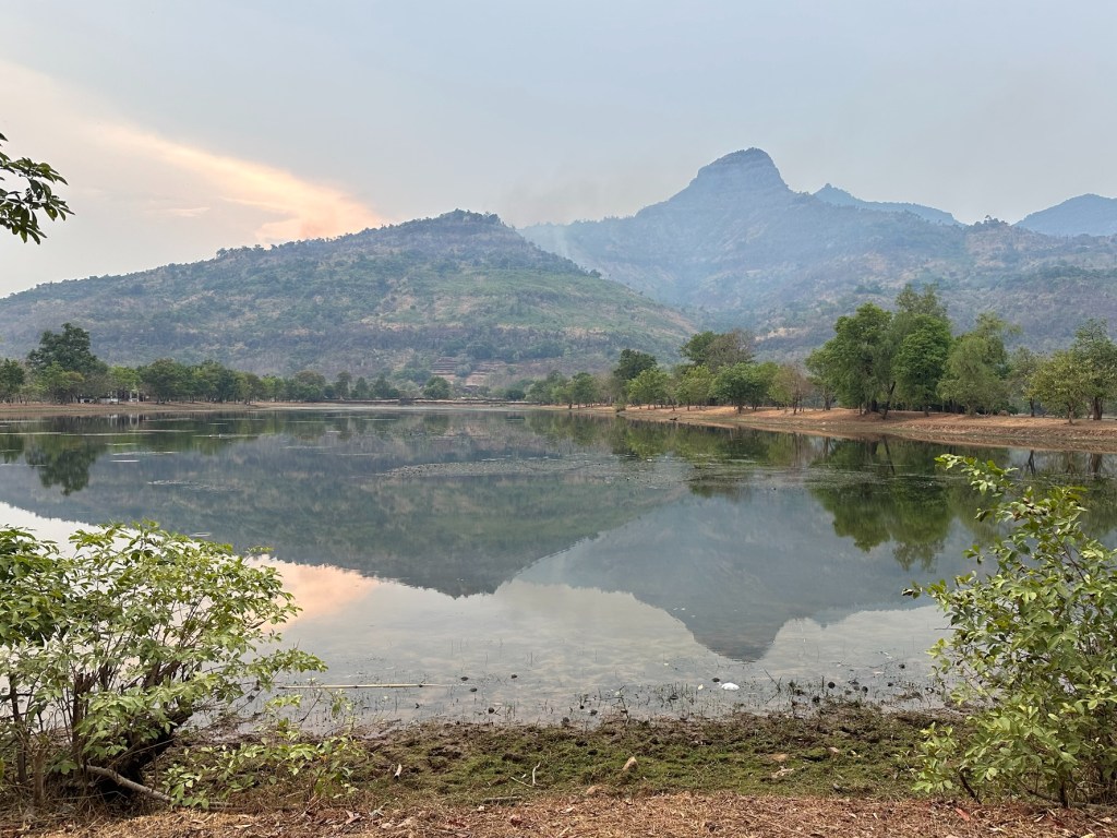 View of a mountain reflecting in a lake