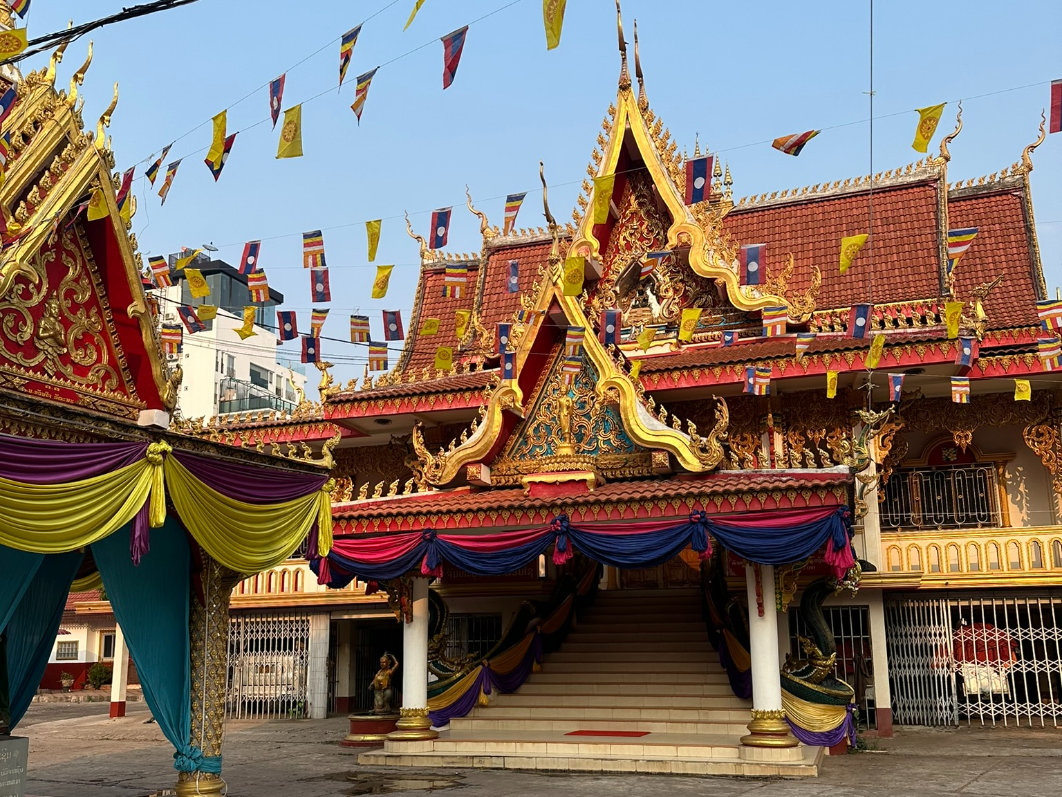View of Laos temple with flags