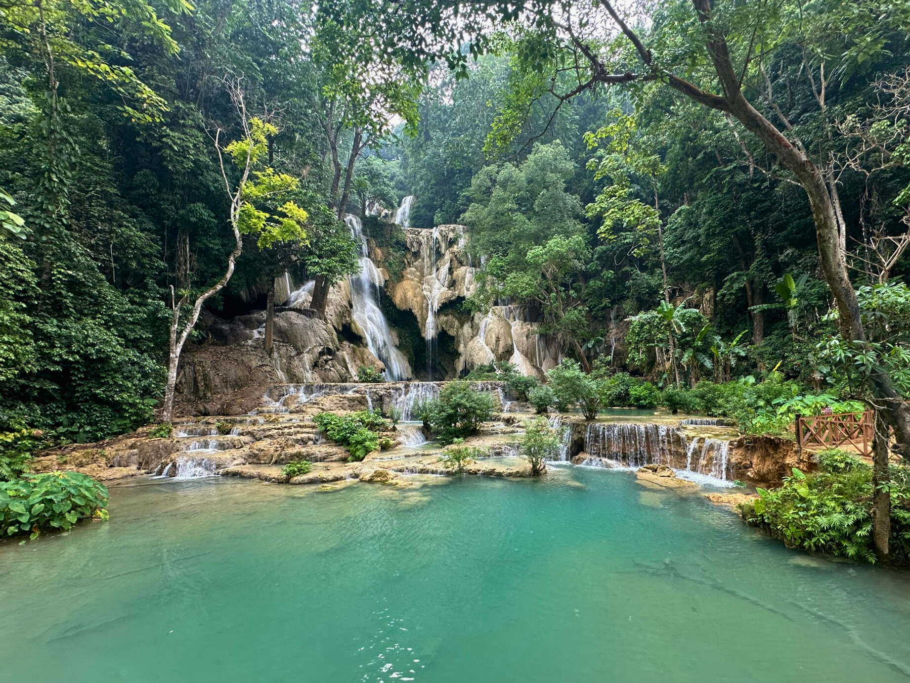 Beautiful view of a waterfall with crystal blue pool